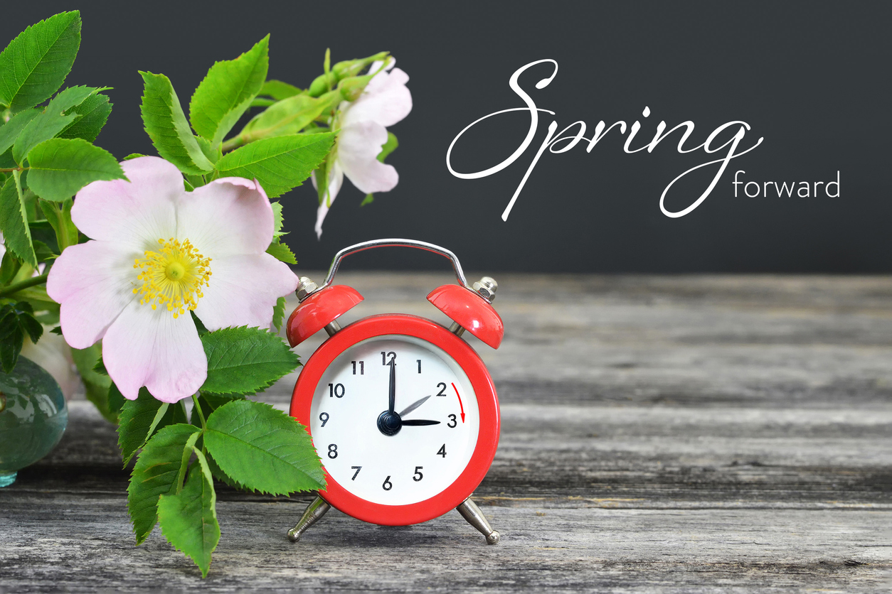 Clock with spring forward message