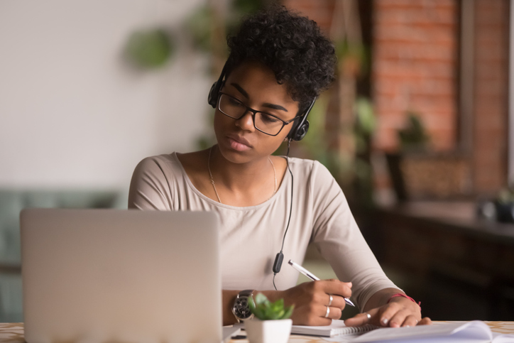 woman looking at a computer