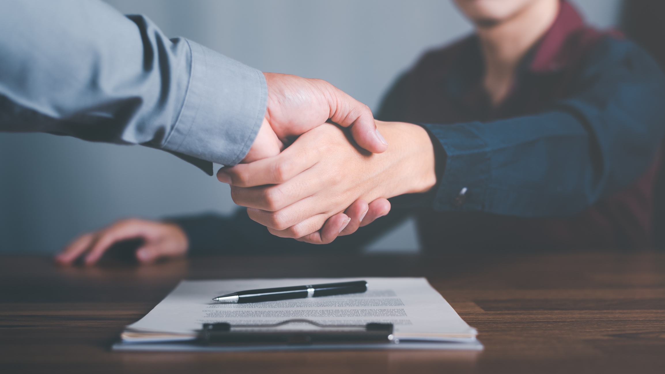 business people shaking hands