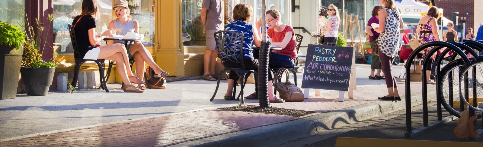 People shopping and eating in downtown Millbrook