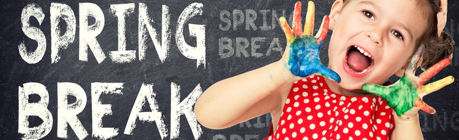 child standing in front of a chalk board that says Spring Break