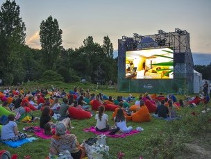 people watching a movie outside