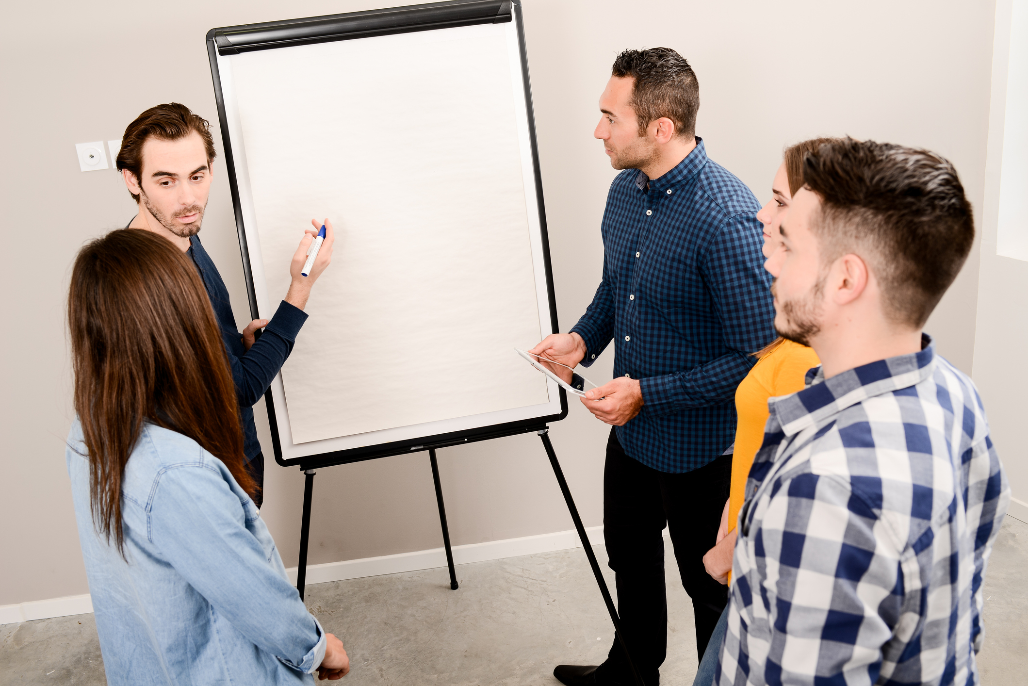 people looking at a storyboard